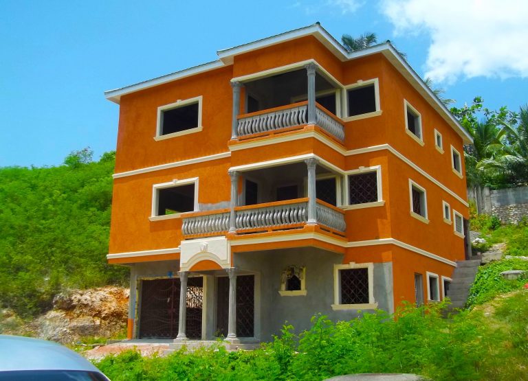 A building with many windows and balconies.