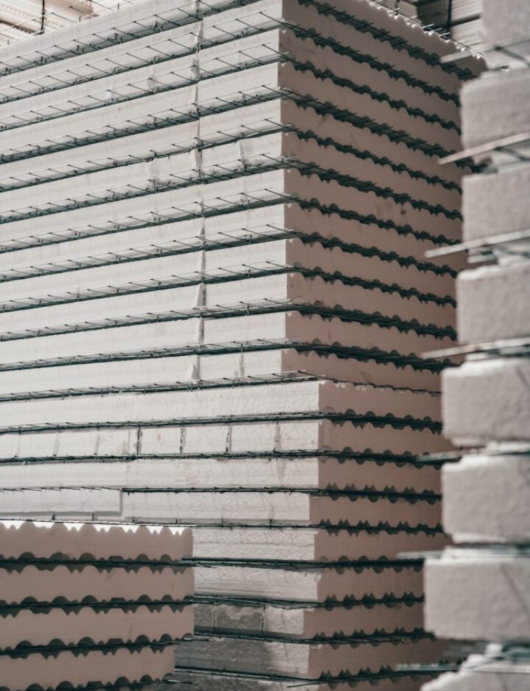 A stack of bricks in the middle of a building.